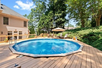 WELCOME HOME TO THIS BEAUTIFUL AND EXPANSIVE HOME FEATURING OVER on Collins Hill Golf Club in Georgia - for sale on GolfHomes.com, golf home, golf lot