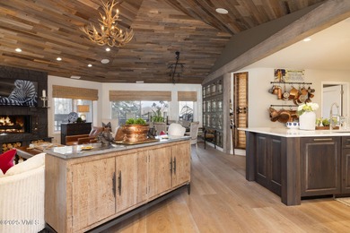 Experience Elevated Mountain Living on the 10th Tee of Country on Country Club of the Rockies in Colorado - for sale on GolfHomes.com, golf home, golf lot