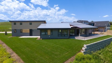 Mountain Modern Retreat in the Powder Horn Golf Community on The Powder Horn Golf Club - Mountain in Wyoming - for sale on GolfHomes.com, golf home, golf lot