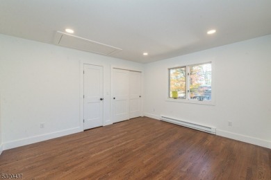 LAKEFRONT townhouse with 2 bedrooms 1 bath and walk-out basement on High Point Golf Club in New Jersey - for sale on GolfHomes.com, golf home, golf lot