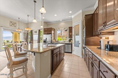 Beautifully maintained single-story home located on the 18th on Somersett Country Club in Nevada - for sale on GolfHomes.com, golf home, golf lot