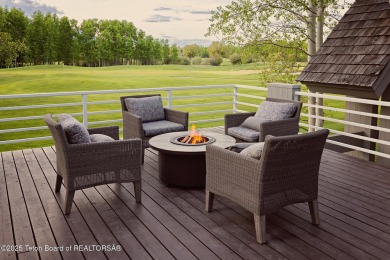 Bordering the 11th fairway of the prestigious Teton Pines golf on Teton Pines Golf Club in Wyoming - for sale on GolfHomes.com, golf home, golf lot