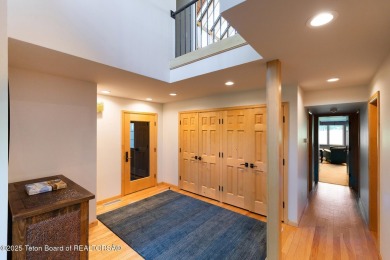 Bordering the 11th fairway of the prestigious Teton Pines golf on Teton Pines Golf Club in Wyoming - for sale on GolfHomes.com, golf home, golf lot