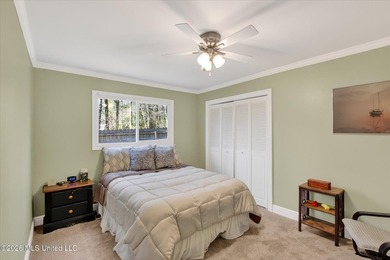 Smart-technology? Yes! Modern conveniences? Yes! Solid brick on Diamondhead Country Club in Mississippi - for sale on GolfHomes.com, golf home, golf lot