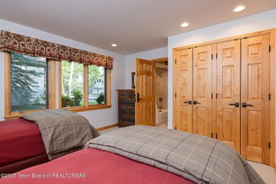 Bordering the 11th fairway of the prestigious Teton Pines golf on Teton Pines Golf Club in Wyoming - for sale on GolfHomes.com, golf home, golf lot