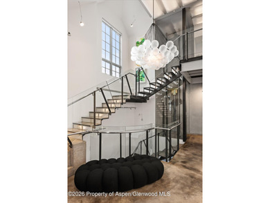 This stunning Maroon Creek townhome has been completely on Maroon Creek Club in Colorado - for sale on GolfHomes.com, golf home, golf lot