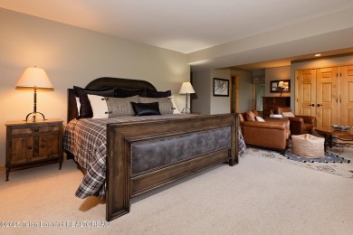 Bordering the 11th fairway of the prestigious Teton Pines golf on Teton Pines Golf Club in Wyoming - for sale on GolfHomes.com, golf home, golf lot