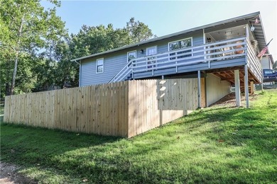 Welcome to this charming remodeled cottage style home featuring on Holiday Island Executive Golf Course in Arkansas - for sale on GolfHomes.com, golf home, golf lot