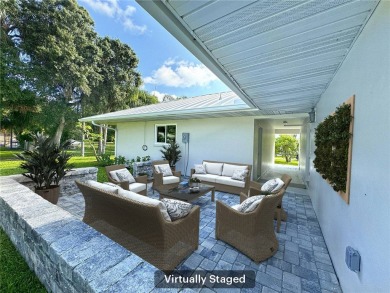 Completely redesigned  remodeled CBS 3/2/2 home in the highly on Vero Beach Country Club in Florida - for sale on GolfHomes.com, golf home, golf lot