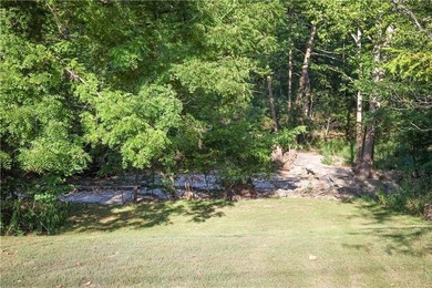 Welcome to this charming remodeled cottage style home featuring on Holiday Island Executive Golf Course in Arkansas - for sale on GolfHomes.com, golf home, golf lot