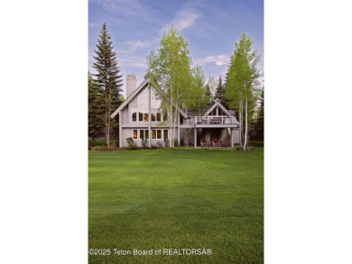 Bordering the 11th fairway of the prestigious Teton Pines golf on Teton Pines Golf Club in Wyoming - for sale on GolfHomes.com, golf home, golf lot