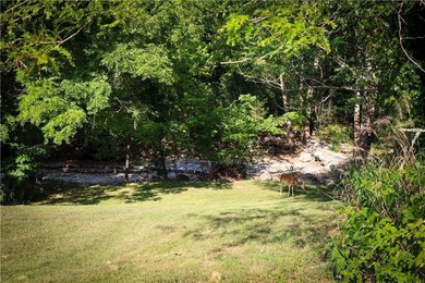 Welcome to this charming remodeled cottage style home featuring on Holiday Island Executive Golf Course in Arkansas - for sale on GolfHomes.com, golf home, golf lot