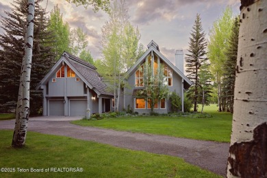 Bordering the 11th fairway of the prestigious Teton Pines golf on Teton Pines Golf Club in Wyoming - for sale on GolfHomes.com, golf home, golf lot