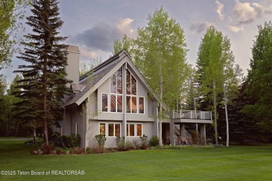 Bordering the 11th fairway of the prestigious Teton Pines golf on Teton Pines Golf Club in Wyoming - for sale on GolfHomes.com, golf home, golf lot