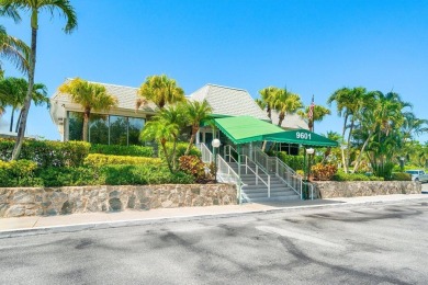 Embrace easy living in this sunlit 2BR/2BA end-unit condo in on The Little Club in Florida - for sale on GolfHomes.com, golf home, golf lot