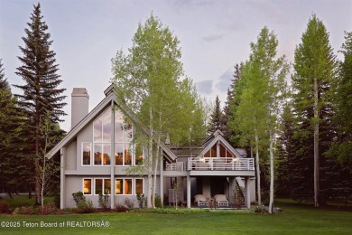 Bordering the 11th fairway of the prestigious Teton Pines golf on Teton Pines Golf Club in Wyoming - for sale on GolfHomes.com, golf home, golf lot