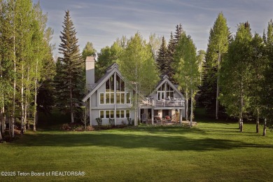Bordering the 11th fairway of the prestigious Teton Pines golf on Teton Pines Golf Club in Wyoming - for sale on GolfHomes.com, golf home, golf lot