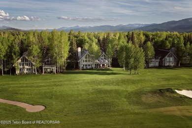 Bordering the 11th fairway of the prestigious Teton Pines golf on Teton Pines Golf Club in Wyoming - for sale on GolfHomes.com, golf home, golf lot