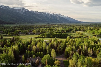 Bordering the 11th fairway of the prestigious Teton Pines golf on Teton Pines Golf Club in Wyoming - for sale on GolfHomes.com, golf home, golf lot