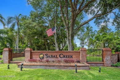 Private lakefront oasis in the gated community of Sabal Creek on The Golf Club At Cypress Head in Florida - for sale on GolfHomes.com, golf home, golf lot