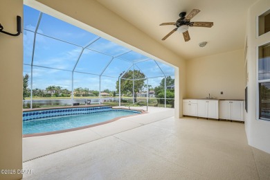 Private lakefront oasis in the gated community of Sabal Creek on The Golf Club At Cypress Head in Florida - for sale on GolfHomes.com, golf home, golf lot