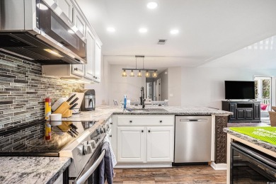 This stylishly upgraded 3-bedroom, 2-bath condo features vaulted on Wachesaw Plantation East Golf Course in South Carolina - for sale on GolfHomes.com, golf home, golf lot