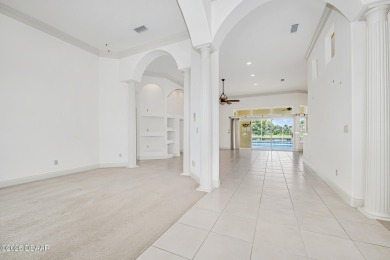 Private lakefront oasis in the gated community of Sabal Creek on The Golf Club At Cypress Head in Florida - for sale on GolfHomes.com, golf home, golf lot