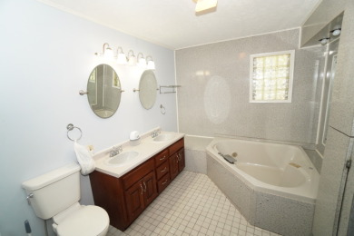 ONE-LEVEL LIVING IN ROLLING ACRES on Morristown Golf and Country Club in Tennessee - for sale on GolfHomes.com, golf home, golf lot