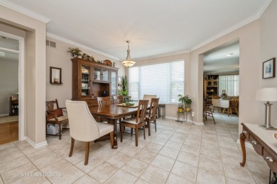 An INVITING front porch and PEACEFUL water feature greets you at on Whisper Creek Golf Club in Illinois - for sale on GolfHomes.com, golf home, golf lot