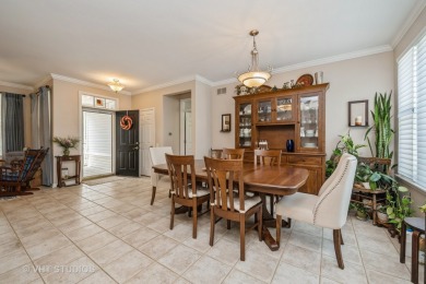 An INVITING front porch and PEACEFUL water feature greets you at on Whisper Creek Golf Club in Illinois - for sale on GolfHomes.com, golf home, golf lot