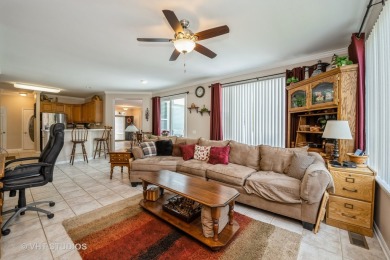 An INVITING front porch and PEACEFUL water feature greets you at on Whisper Creek Golf Club in Illinois - for sale on GolfHomes.com, golf home, golf lot