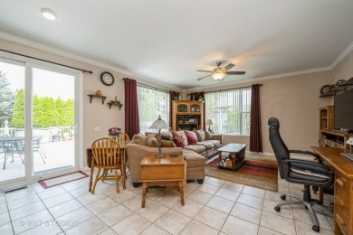 An INVITING front porch and PEACEFUL water feature greets you at on Whisper Creek Golf Club in Illinois - for sale on GolfHomes.com, golf home, golf lot