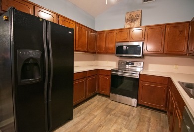 Affordable nice condo. Featuring den with wood burning fireplace on Lakewood Golf Course in Alabama - for sale on GolfHomes.com, golf home, golf lot