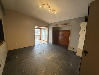 Investor or project-ready opportunity! This ranch with walkout on Hankerd Hills Golf Course in Michigan - for sale on GolfHomes.com, golf home, golf lot