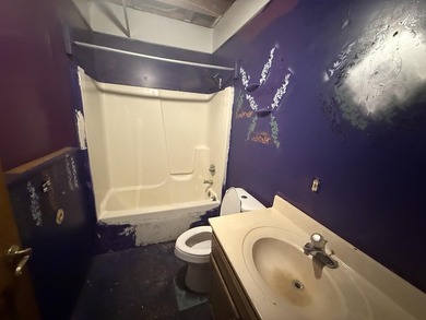 Investor or project-ready opportunity! This ranch with walkout on Hankerd Hills Golf Course in Michigan - for sale on GolfHomes.com, golf home, golf lot