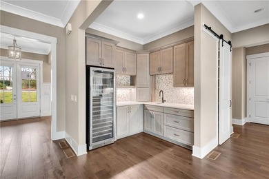 This executive estate redefines luxury living, boasting an on Cherokee Town and Country Club in Georgia - for sale on GolfHomes.com, golf home, golf lot