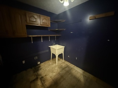 Investor or project-ready opportunity! This ranch with walkout on Hankerd Hills Golf Course in Michigan - for sale on GolfHomes.com, golf home, golf lot