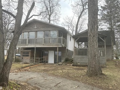 Investor or project-ready opportunity! This ranch with walkout on Hankerd Hills Golf Course in Michigan - for sale on GolfHomes.com, golf home, golf lot
