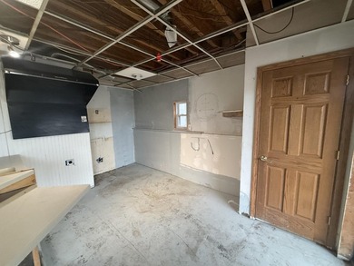 Investor or project-ready opportunity! This ranch with walkout on Hankerd Hills Golf Course in Michigan - for sale on GolfHomes.com, golf home, golf lot