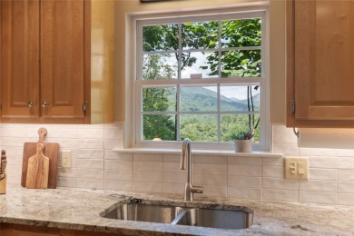 Perfectly positioned in the heart of the Highlands Cashiers on Sapphire National Golf Club in North Carolina - for sale on GolfHomes.com, golf home, golf lot