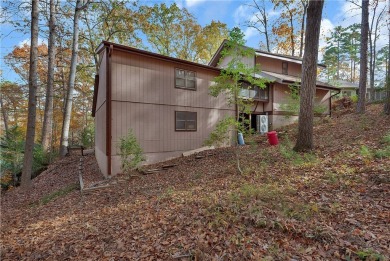 Keowee Key interior home located on a half acre wooded lot in on Keowee Key Golf and Country Club in South Carolina - for sale on GolfHomes.com, golf home, golf lot