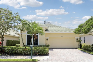 This single-story, three-bedroom / three-bathroom home offers a on PGA National Golf Club in Florida - for sale on GolfHomes.com, golf home, golf lot
