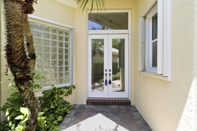 This single-story, three-bedroom / three-bathroom home offers a on PGA National Golf Club in Florida - for sale on GolfHomes.com, golf home, golf lot