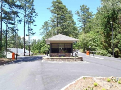 Keowee Key interior home located on a half acre wooded lot in on Keowee Key Golf and Country Club in South Carolina - for sale on GolfHomes.com, golf home, golf lot