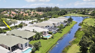 This single-story, three-bedroom / three-bathroom home offers a on PGA National Golf Club in Florida - for sale on GolfHomes.com, golf home, golf lot