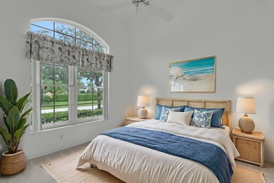 This single-story, three-bedroom / three-bathroom home offers a on PGA National Golf Club in Florida - for sale on GolfHomes.com, golf home, golf lot