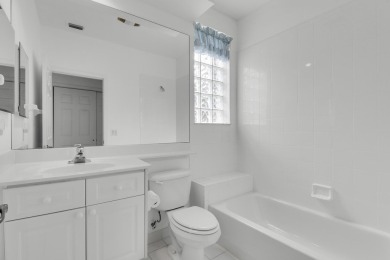 This single-story, three-bedroom / three-bathroom home offers a on PGA National Golf Club in Florida - for sale on GolfHomes.com, golf home, golf lot