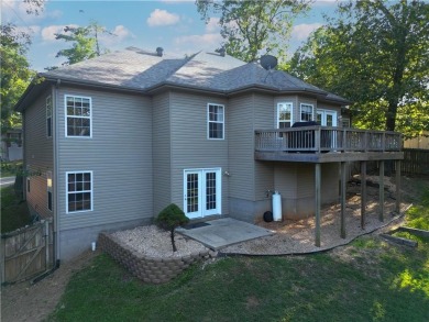 Private wooded retreat with finished walk-out basement and on Bella Vista - Metfield Golf Complex and Country Club in Arkansas - for sale on GolfHomes.com, golf home, golf lot