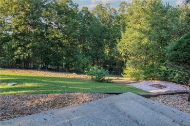 Private wooded retreat with finished walk-out basement and on Bella Vista - Metfield Golf Complex and Country Club in Arkansas - for sale on GolfHomes.com, golf home, golf lot