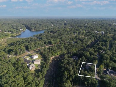 Private wooded retreat with finished walk-out basement and on Bella Vista - Metfield Golf Complex and Country Club in Arkansas - for sale on GolfHomes.com, golf home, golf lot